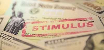 A check with the word "Stimulus" stamped on it